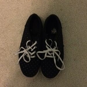Black and white vans lace up